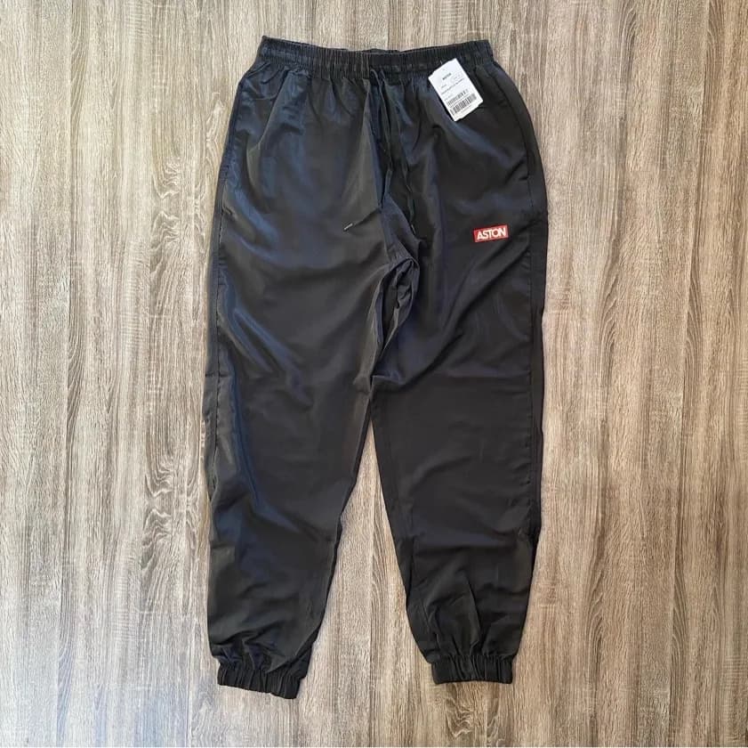 Calça tactel Aston